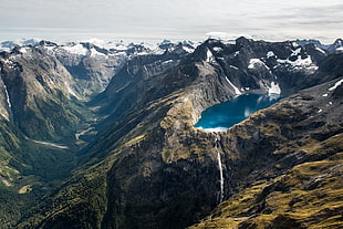 brown land formation with lake, lake, waterfall, river, mountains HD wallpaper