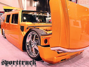 orange and black ride on toy car, Hummer