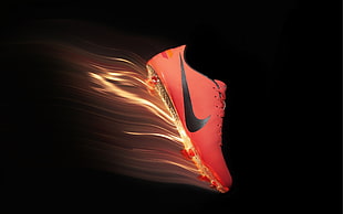 unpaired red Nike cleats