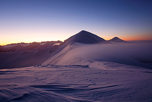 time laps photo of snowy mountain peak HD wallpaper