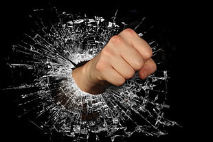 person punch glass hole HD wallpaper