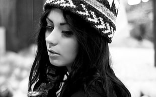 grayscale photo of a woman wearing beanie