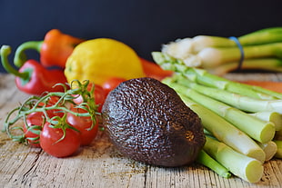vegetables on brown wooden slab
