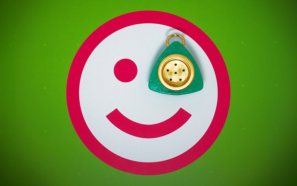 smiley with green and brown ornament on eye illustration HD wallpaper