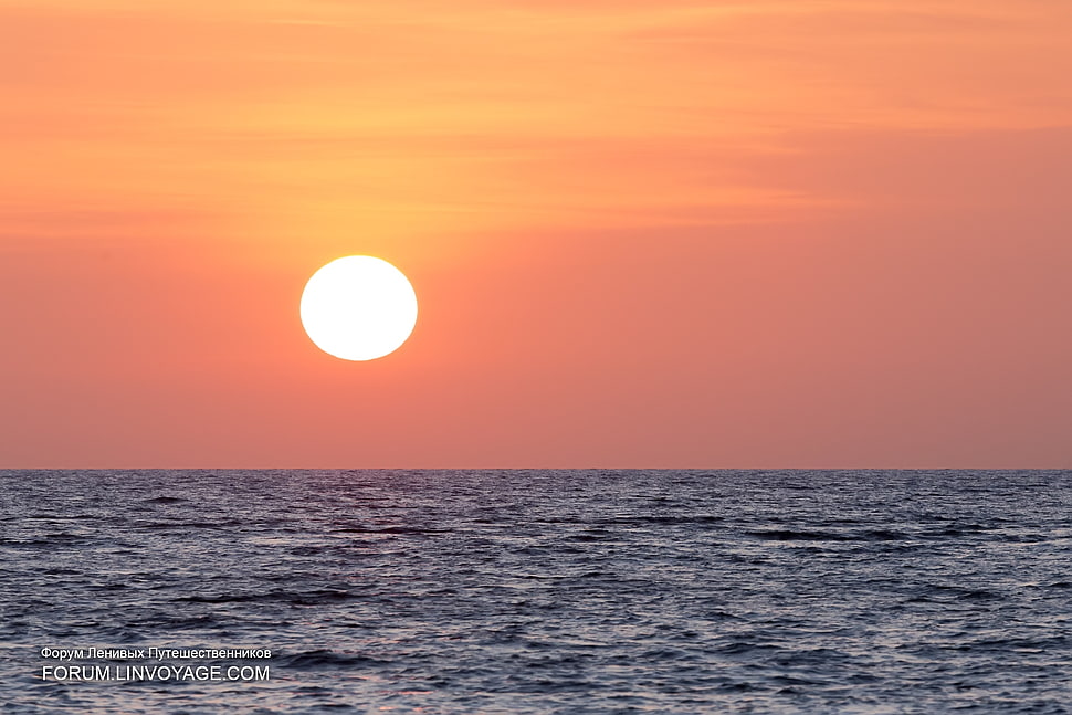 sunset view of blue beach HD wallpaper