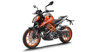 orange and black Duke naked motorcycle