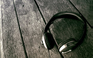 grayscale photo of wireless headphones