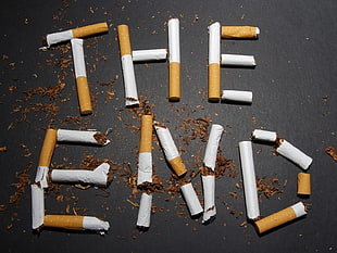the end text through white and red cigar HD wallpaper