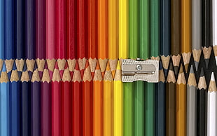 assorted color pencils with stainless steel sharpeener