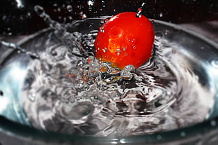 red ball drop on water