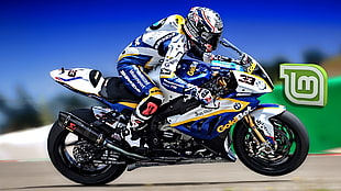 blue and blue GoldBet sports bike with rider HD wallpaper