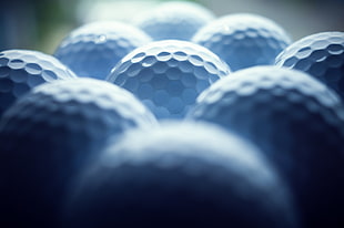 nine white golf balls