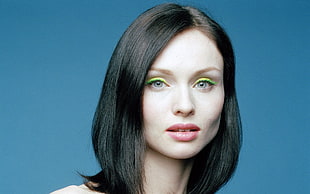 woman wearing green eyeliner