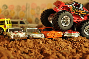 assorted-color vehicle toys, Hot Wheels, Matchbox, monster trucks, toys
