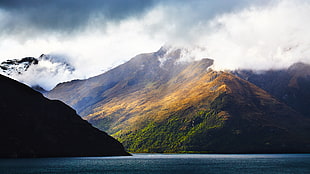 brown rocky mountain, mountains, lake, landscape HD wallpaper