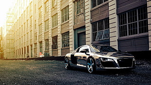 black Audi R8 coupe on road near building during daytime
