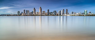 high-rise buildings and sea, water, reflection, city, skyscraper