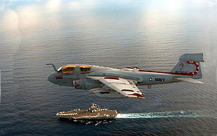 white and red plane, Northrop Grumman EA-6B Prowler, aircraft carrier, military aircraft, aerial view