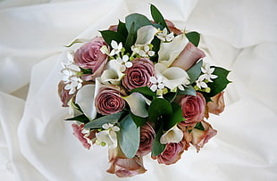 pink Roses and white Calla Lilies bouquet closeup photography