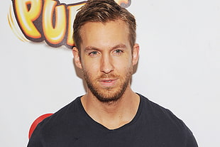 photo of man wearing black crew-neck shirt HD wallpaper