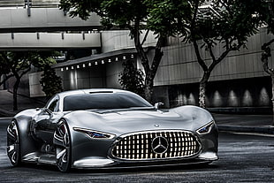 grey Mercedes-Benz luxury car on grey asphalt road