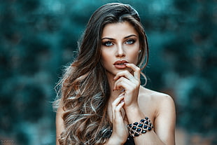 woman wearing beaded black bracelet in shallow focus photography HD wallpaper