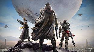 three men standing on hill and  holding guns with moon background