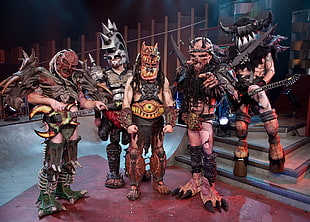 group of people wearing a assorted monster costumes