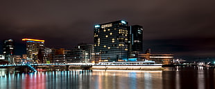 nightime photo of cityscape near body of water, germany HD wallpaper