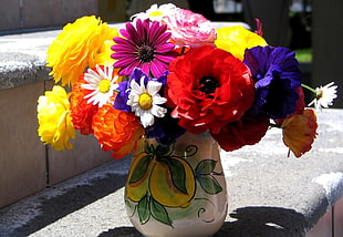 multi-color flowers on ceramic vase