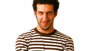 man smiling wearing striped shirt