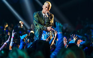 photo of Slim Shady Eminem rapping facing at the people HD wallpaper