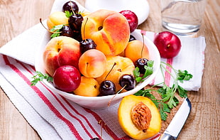 bowl of several assorted fruits HD wallpaper