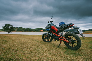red and black sports bike HD wallpaper