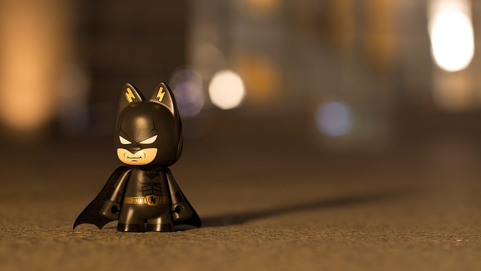 shallow focus photography of Batman mini figure toy HD wallpaper