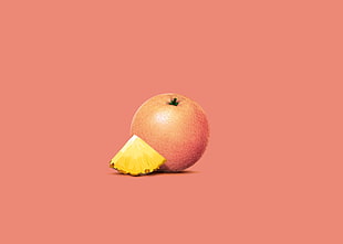 sliced Pineapple beside Orange fruit against orange background