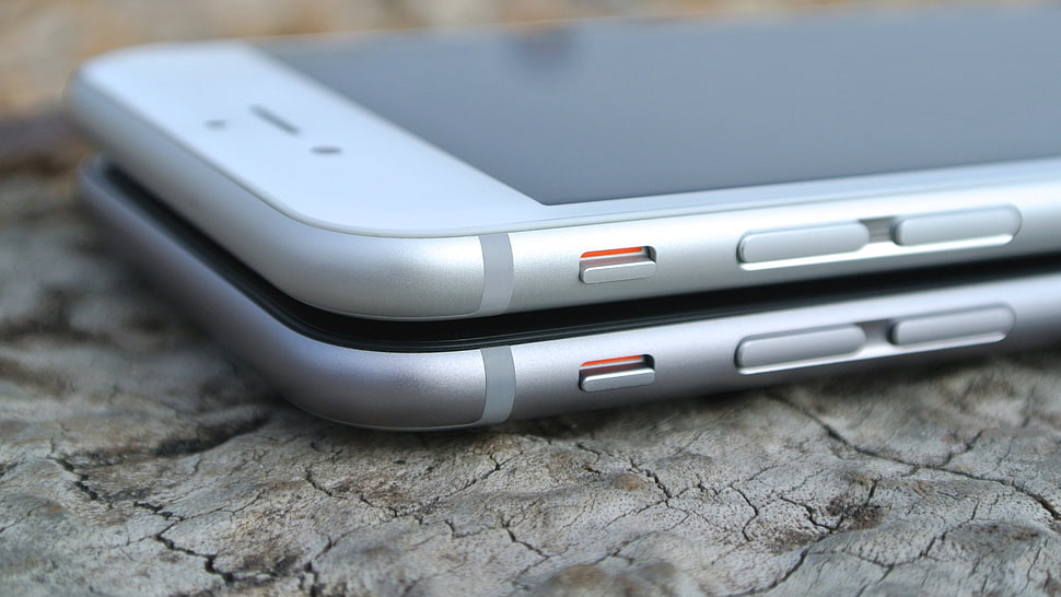shallow focus photography of two silver iPhone 6 HD wallpaper