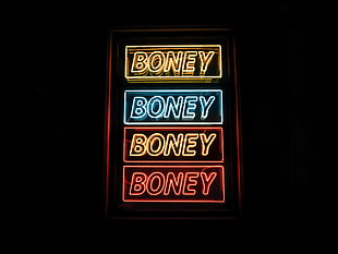 yellow, red, and blue Boney lighted signage