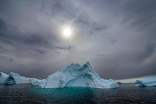photo of ice bergs during daytime
