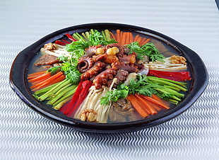 assorted vegetables in black ceramic bowl