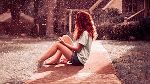 women's gray T-shirt and black denim short shorts, redhead, sitting, rain, women