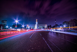 time-lapse photography of road traffic during night HD wallpaper