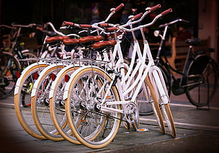white bicycles parked