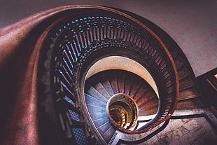close up photo of swirl staircase building HD wallpaper