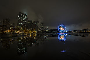 blue ferris wheel, cityscape, night