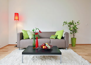 gray fabric sofa and green throw pillows HD wallpaper