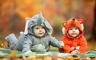 baby's gray elephant costume, baby, on the floor