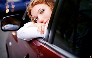 woman inside a car HD wallpaper