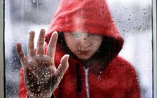 photo of person in red hoodie
