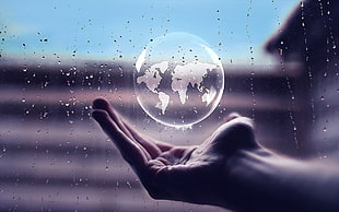 person holding bubble, glass, water drops, hands, globes